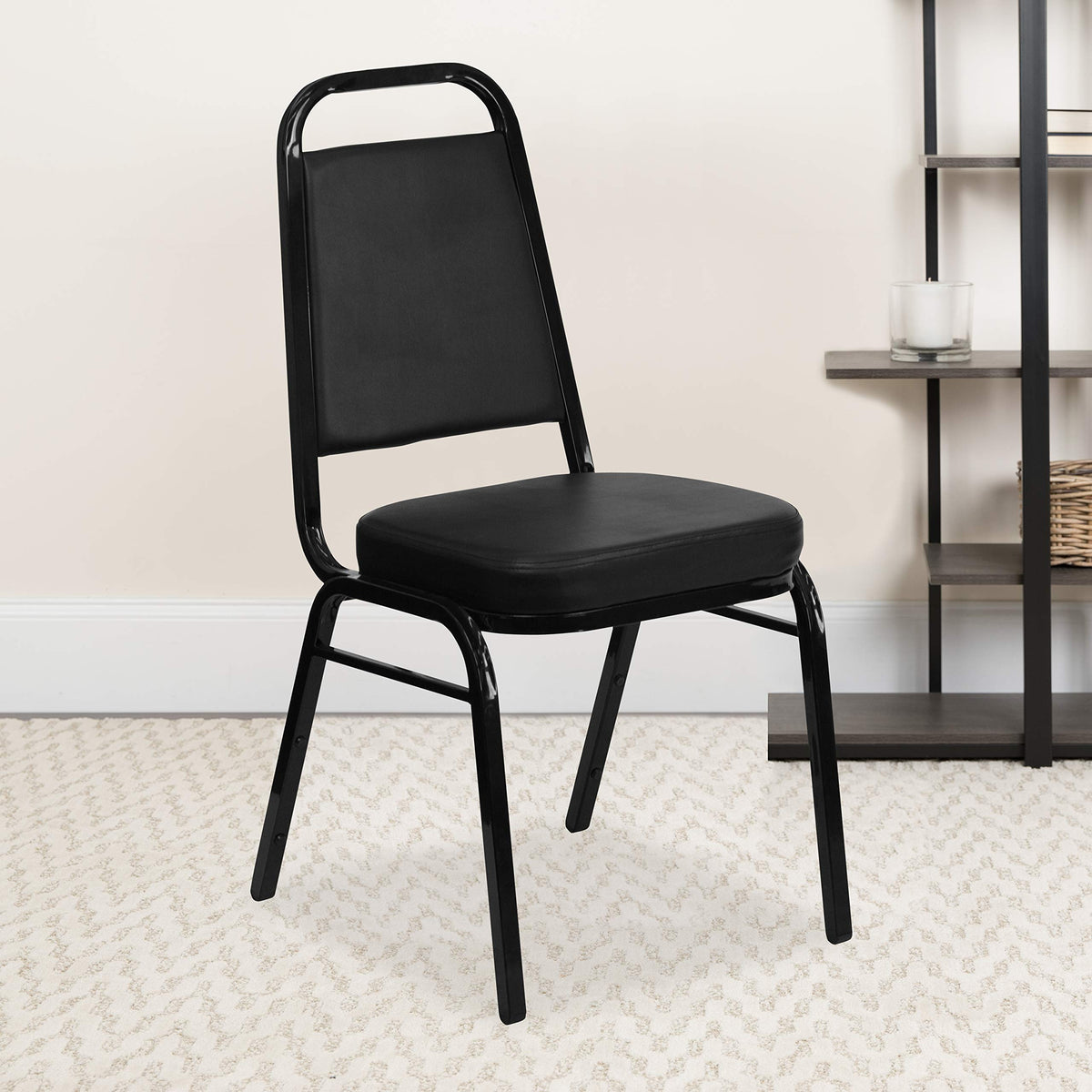 Emma + Oliver Black Vinyl Trapezoidal Back Stacking Banquet Chair, 17.5"W x 20.25"D x 36"H, Black Vinyl/black Frame